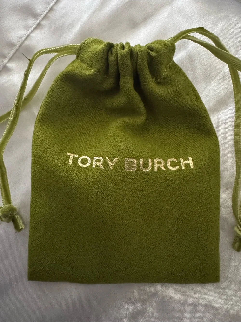 Tory Burch Light Blue Enamel Logo Studs and bracelet set.